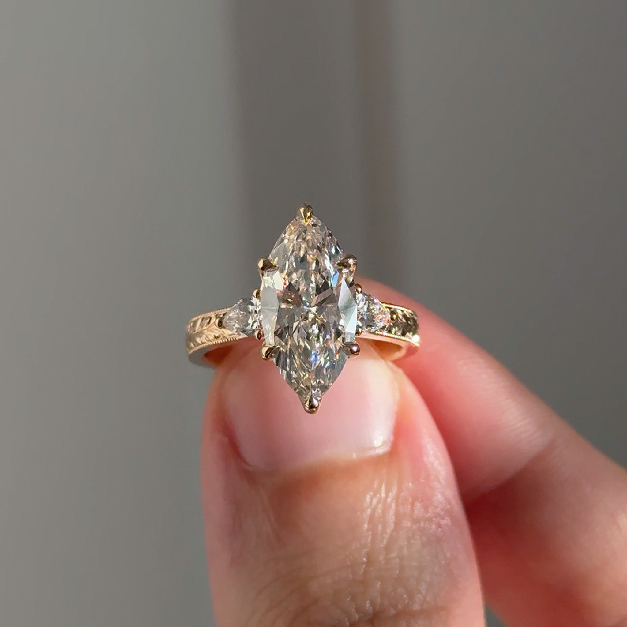Three Stone Hand Engraved Marquise Ring
