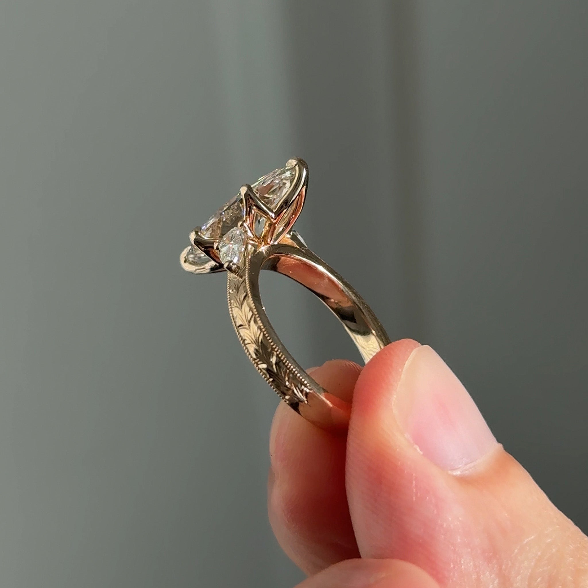 Three Stone Hand Engraved Marquise Engagement Ring