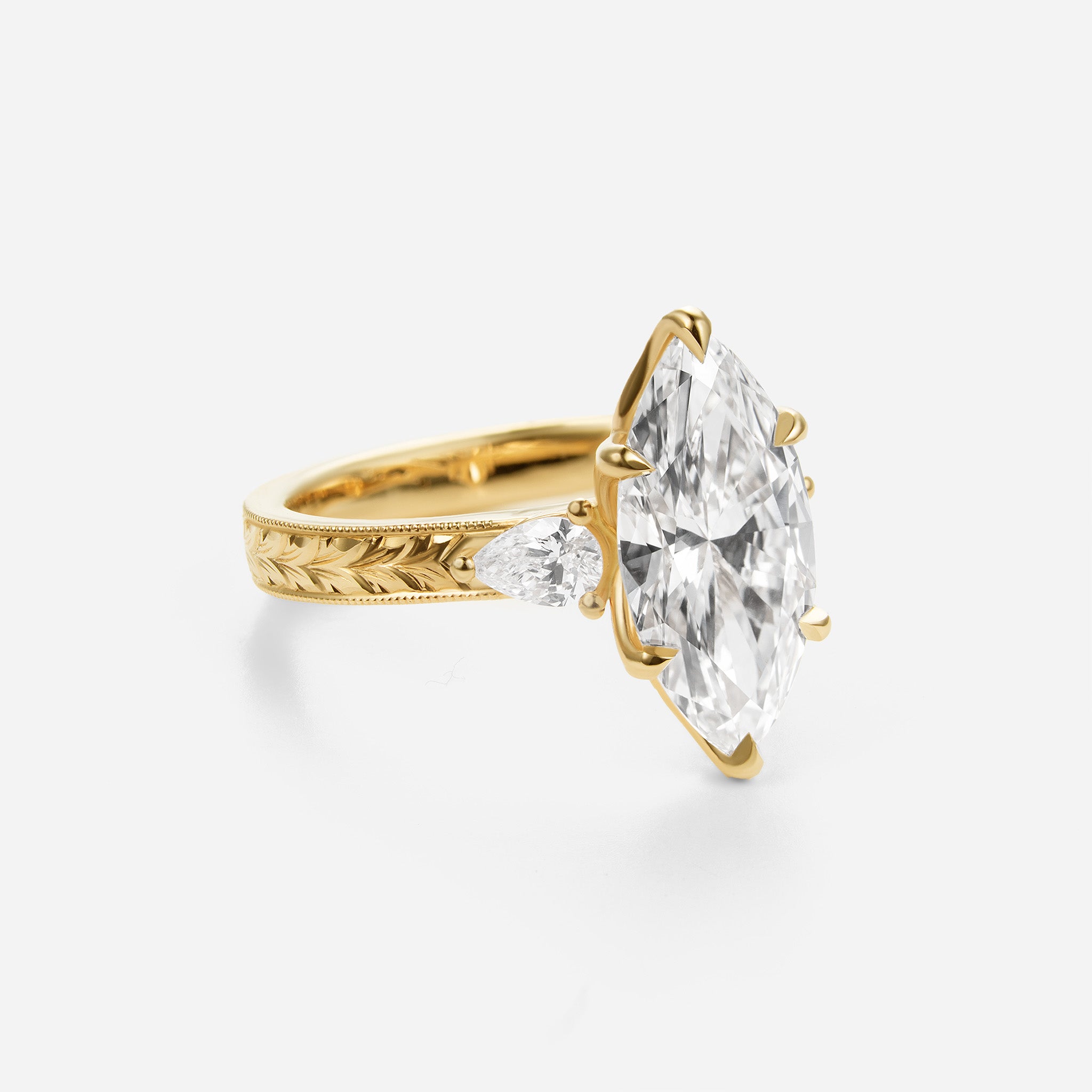 Three Stone Hand Engraved Marquise Ring