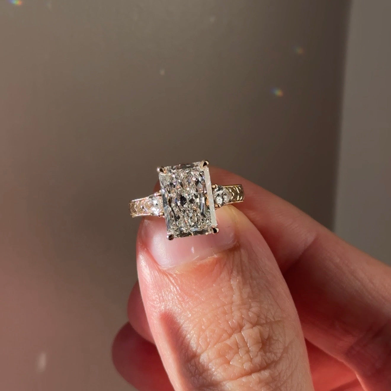 Three Stone Hand Engraved Radiant Engagement Ring