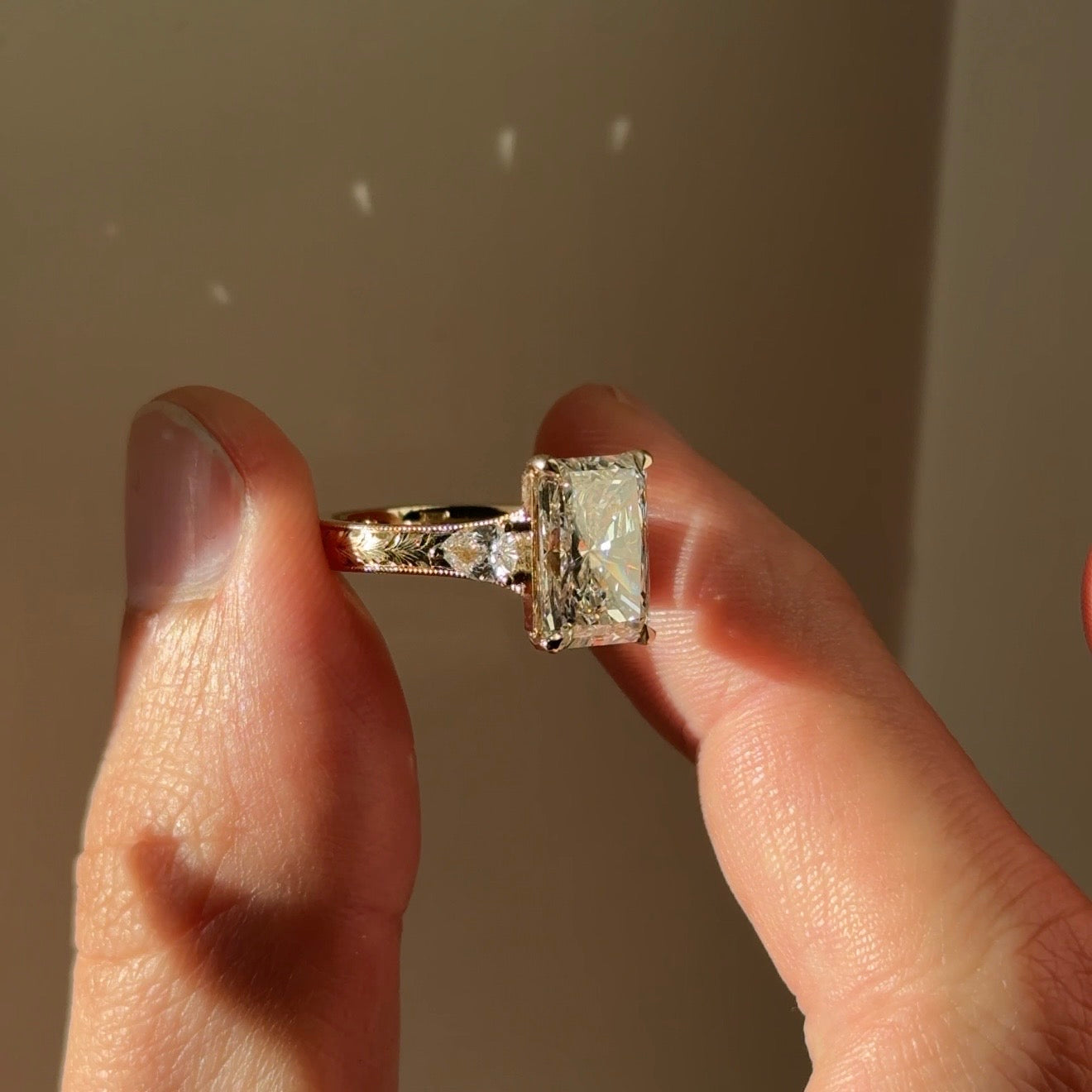 Three Stone Hand Engraved Radiant Engagement Ring